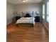 Spacious bedroom with hardwood flooring and large windows for tons of natural light at 8494 Langhorne Creek St, Las Vegas, NV 89139