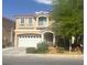 Charming two-story home with a two car garage, desert landscaping, and a red tile roof at 8494 Langhorne Creek St, Las Vegas, NV 89139