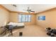 Another view of the bedroom, highlighting the carpet and natural light at 8869 Dove Cove Dr, Las Vegas, NV 89129