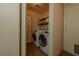 Well-equipped laundry room with modern washer and dryer units at 8869 Dove Cove Dr, Las Vegas, NV 89129