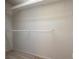 Unfinished walk-in closet with carpet flooring and metal shelving at 9678 Swaying Elms Ct, Las Vegas, NV 89147