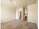 This bedroom has neutral walls, carpeted floors, and a view into the ensuite bathroom at 1123 Scenic Crest Dr, Henderson, NV 89052