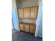 Hallway with built-in wooden cabinetry at 1123 Scenic Crest Dr, Henderson, NV 89052