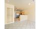 Kitchen view showcasing the wood cabinets, stainless steel appliances, and tile flooring at 1123 Scenic Crest Dr, Henderson, NV 89052