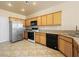 Spacious kitchen with wood cabinets, granite countertops, and stainless steel appliances at 1123 Scenic Crest Dr, Henderson, NV 89052