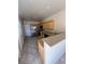 Spacious kitchen featuring tile flooring, stainless refrigerator, and laminate countertops at 1123 Scenic Crest Dr, Henderson, NV 89052