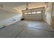 Spacious garage with automatic door, offering plenty of room for parking and storage at 11260 Burning River St, Las Vegas, NV 89183