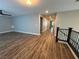 Bright hallway with hardwood flooring and neutral walls offers a clean and modern feel at 11260 Burning River St, Las Vegas, NV 89183