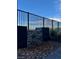 Backyard showcasing a rock waterfall, stone flooring, plants, and a clear blue sky at 1586 Crowned Eagle St, Las Vegas, NV 89138