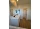 Bathroom featuring a double sink vanity, and modern fixtures and wood flooring at 1586 Crowned Eagle St, Las Vegas, NV 89138