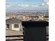 View of the city skyline from the rooftop deck of a modern home in a new neighborhood development at 1586 Crowned Eagle St, Las Vegas, NV 89138