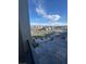 Elevated community view with a park-like setting and views of a distant city at 1586 Crowned Eagle St, Las Vegas, NV 89138