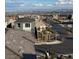 Street view of a new neighborhood with sidewalks and landscaping; some homes are still under construction at 1586 Crowned Eagle St, Las Vegas, NV 89138