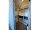 Spacious walk-in closet with installed shelving and a modern closet rod system providing ample storage at 1586 Crowned Eagle St, Las Vegas, NV 89138