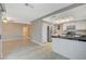 Open concept kitchen featuring stainless steel appliances and a view into a living space at 1800 Summit Pointe Dr, Las Vegas, NV 89117