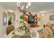 Bright dining area featuring modern chandelier and views of the entertainment center at 1811 Tiger Creek Ave, Henderson, NV 89012