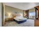 Comfortable bedroom featuring a king bed, city view, and modern decor at 211 E Flamingo Rd # 1707, Las Vegas, NV 89169