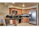 Modern kitchen with stainless steel appliances and seating at the counter at 211 E Flamingo Rd # 1707, Las Vegas, NV 89169