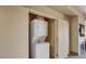 Functional laundry area with stacked washer and dryer at 211 E Flamingo Rd # 1707, Las Vegas, NV 89169