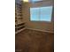 Bedroom featuring built-in shelves and a window to allow for natural light at 2223 Rugged Mesa Dr, Laughlin, NV 89029