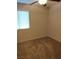 Bedroom with plush carpeting and ceiling fan at 2223 Rugged Mesa Dr, Laughlin, NV 89029