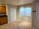 Bright dining area with tile floors, neutral wall paint and natural light at 2223 Rugged Mesa Dr, Laughlin, NV 89029