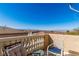 Scenic balcony with patio furniture offers stunning views of the mountains and valley at 225 Priority Point St, Henderson, NV 89012