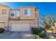 Charming home featuring a two-car garage and well-maintained landscaping at 225 Priority Point St, Henderson, NV 89012