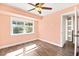 This bedroom has wood-look floors and a large window at 2301 W El Camino Ave, Las Vegas, NV 89102