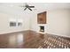 Bright living room features hardwood floors, fireplace, and abundant natural light at 2301 W El Camino Ave, Las Vegas, NV 89102