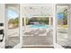 A beautiful pool and pergola viewed from a covered patio at 2301 W El Camino Ave, Las Vegas, NV 89102