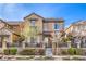 Charming two-story home with a well-manicured front yard, stone accents, and welcoming entrance at 2375 Malaga Peak St, Las Vegas, NV 89135