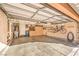 Spacious garage featuring built-in storage, a bicycle rack, and ample room for vehicles and projects at 2375 Malaga Peak St, Las Vegas, NV 89135