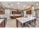 Modern kitchen featuring a large island, stainless steel appliances, and sleek countertops at 2375 Malaga Peak St, Las Vegas, NV 89135