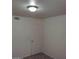 Bright bedroom with neutral carpet has a large closet door and bright walls at 2725 S Nellis Blvd # 1158, Las Vegas, NV 89121