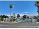 View of the community entrance gate with mature landscaping at 2725 S Nellis Blvd # 1158, Las Vegas, NV 89121