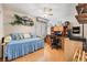 Cozy bedroom featuring a wooden desk, a daybed, and a ceiling fan for added comfort at 2735 Faiss Dr, Las Vegas, NV 89134