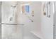 Shower featuring grab bars and a built-in seat at 2735 Faiss Dr, Las Vegas, NV 89134