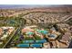 Aerial view of community amenities including pools, tennis courts, lush landscaping and resident common areas at 283 Parisian Springs Ct, Las Vegas, NV 89148