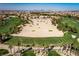 Aerial view of the golf course with its expansive green fairways and manicured sand traps at 283 Parisian Springs Ct, Las Vegas, NV 89148