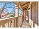 Inviting outdoor balcony with a comfy chair and a view of surrounding greenery at 3157 Pinehurst Dr # B, Las Vegas, NV 89109