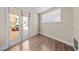 Cozy bedroom featuring French doors leading to an outdoor patio and bright natural light at 3585 Tobias Ln, Las Vegas, NV 89120