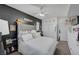 Cozy bedroom featuring a gray upholstered bed and large closet at 3741 Lily Haven Ave, Las Vegas, NV 89120