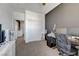 View of a spacious bedroom with closet, neutral carpet and a view of the hall at 3741 Lily Haven Ave, Las Vegas, NV 89120