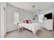 Bright bedroom with white walls, carpet, and natural light from windows at 3741 Lily Haven Ave, Las Vegas, NV 89120