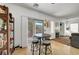 Bright dining area features a sliding door to the backyard and a cozy round table with seating at 3741 Lily Haven Ave, Las Vegas, NV 89120