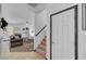 Entryway with stairs leading up to a living room featuring a fireplace at 3741 Lily Haven Ave, Las Vegas, NV 89120