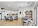 Spacious kitchen features a breakfast bar with seating, white cabinetry, and modern appliances at 3741 Lily Haven Ave, Las Vegas, NV 89120