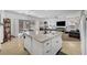 Large island provides ample counter space in this open concept kitchen and living area at 3741 Lily Haven Ave, Las Vegas, NV 89120