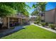 Poolside community BBQ area with covered grills and lush landscaping at 3883 Desert Marina Dr # 245, Laughlin, NV 89029